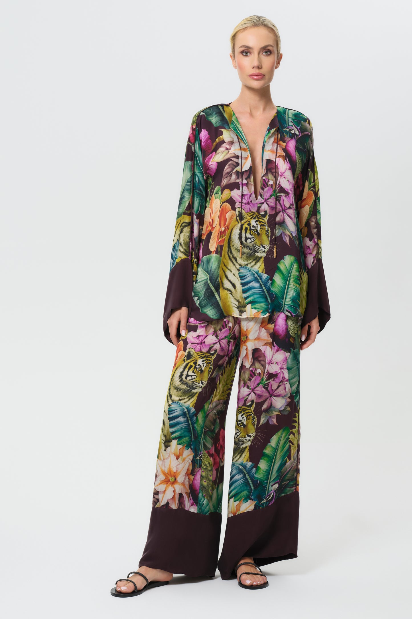 Model in multicolor printed long-sleeve top with matching pants