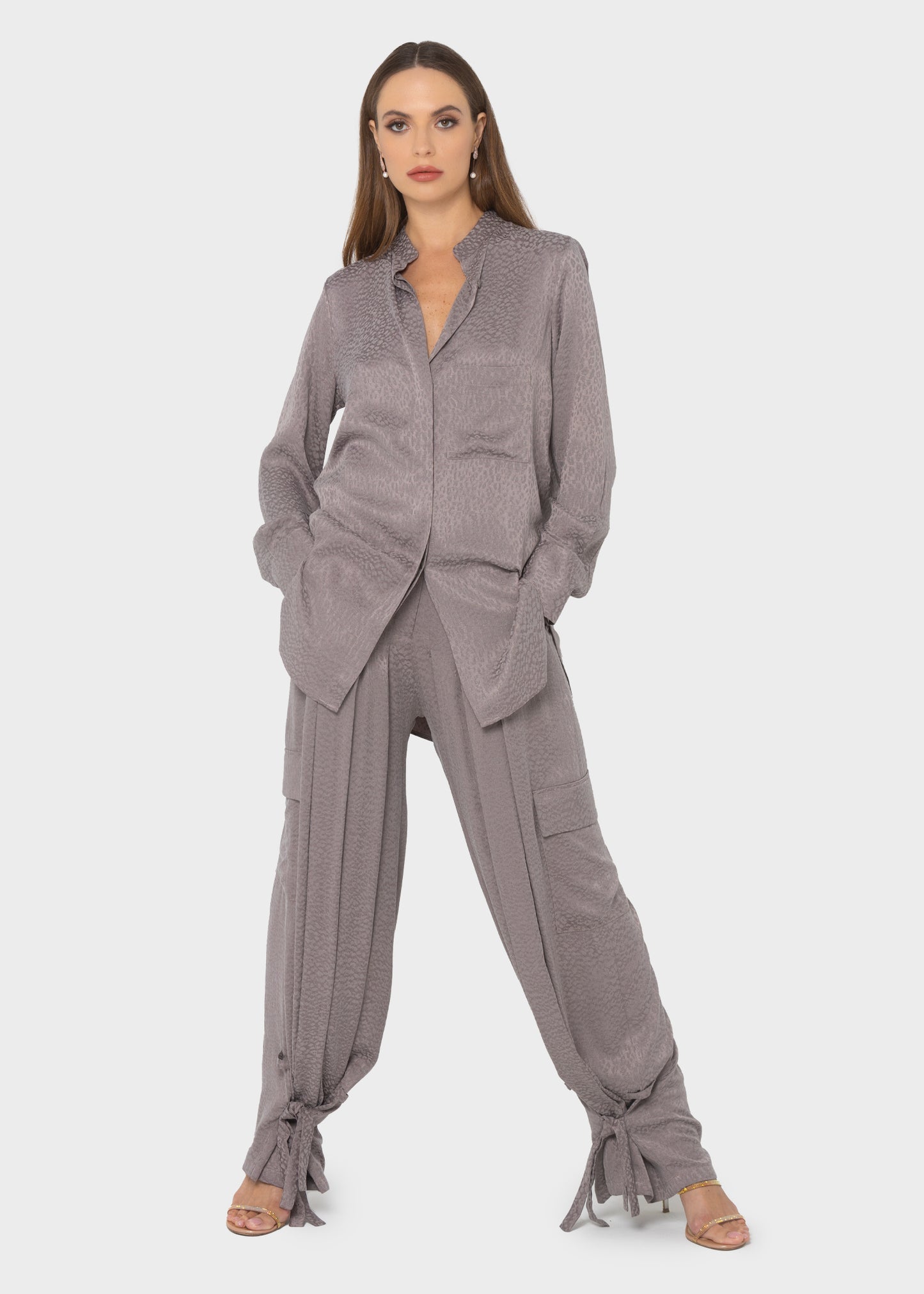 Women wearing a gray collar button-up shirts with relaxed fits