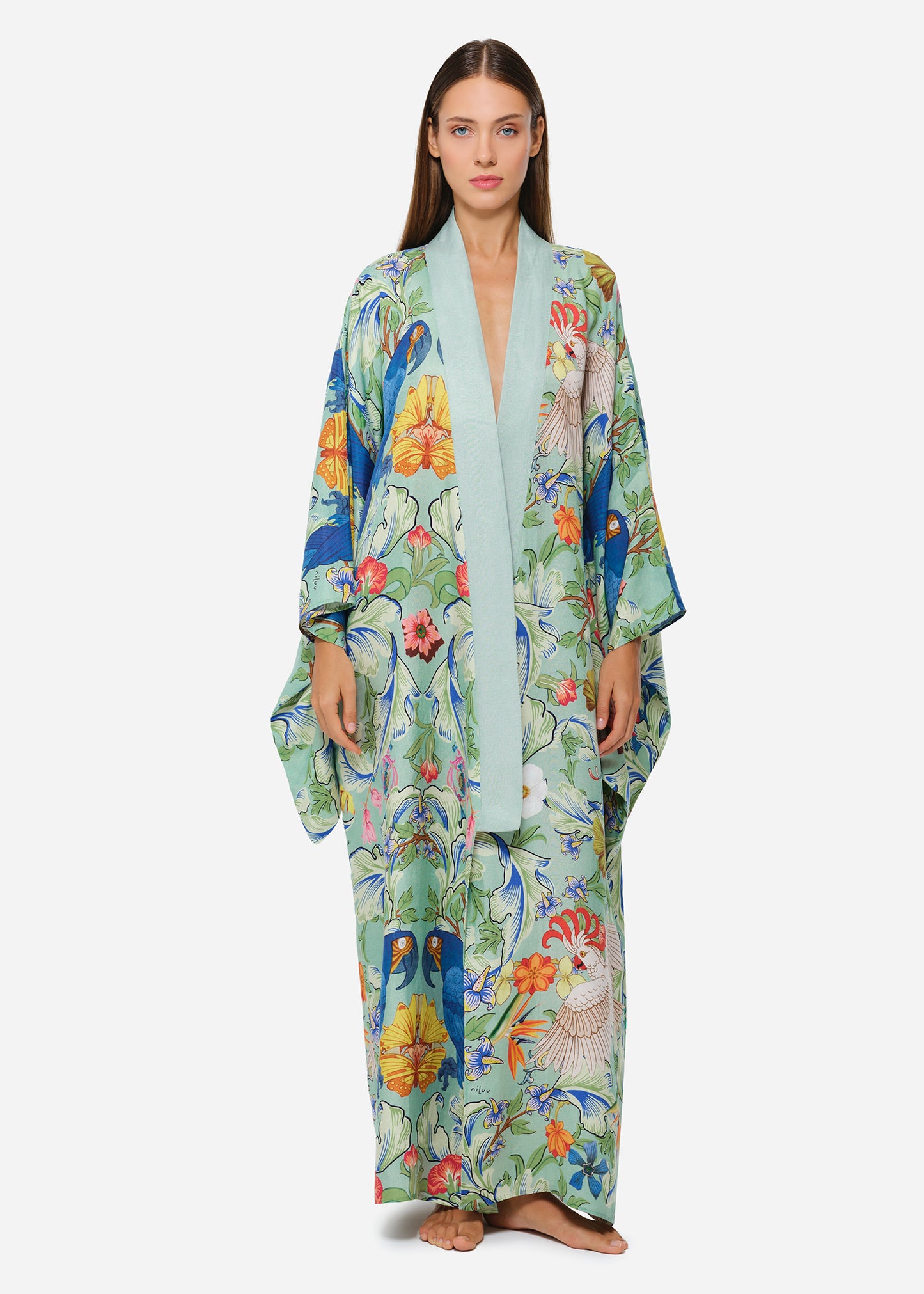 Mint green printed kimono with wide sleeves and sash belt.
