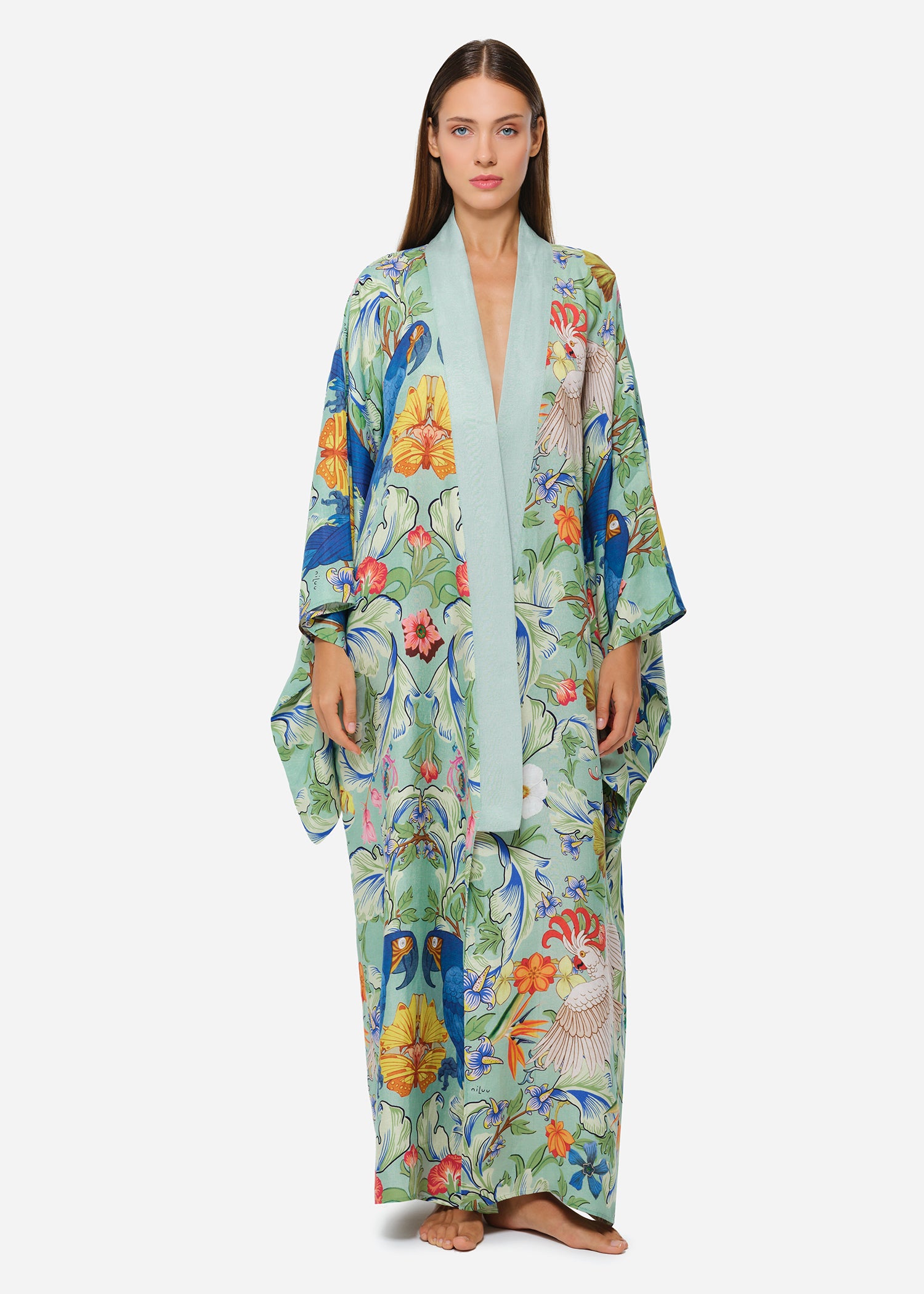 Mint green printed kimono with wide sleeves and sash belt.