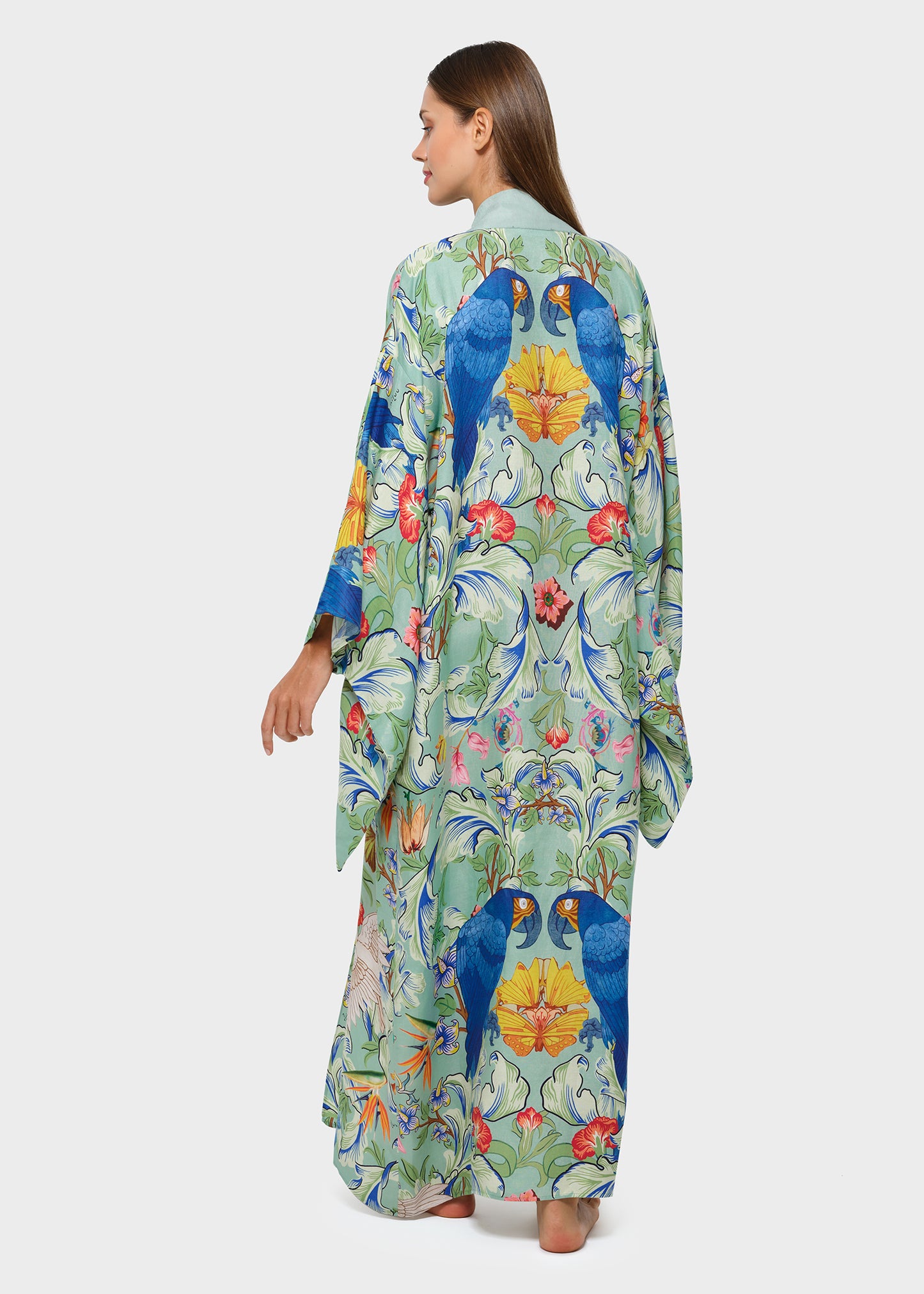 Back view of long mint green kimono robe with tropical bird and floral print.