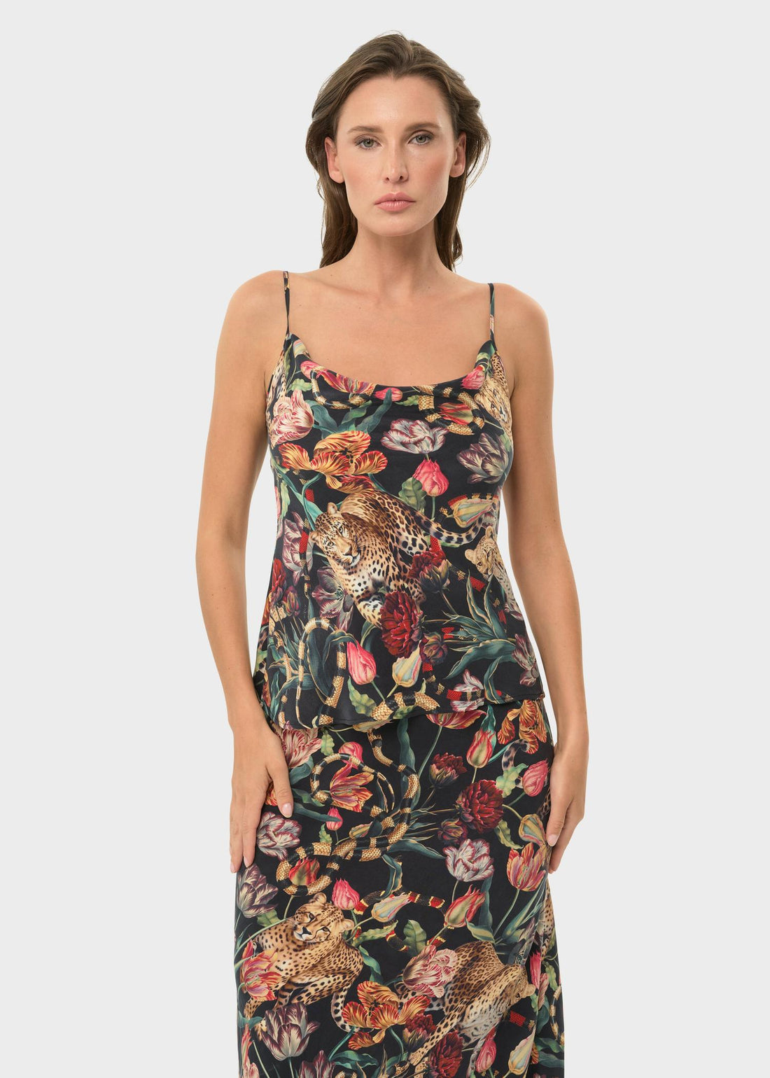 niLuu Presley Mystique Cowl Cami Top highlighting its elegant, light-catching cowl neckline.